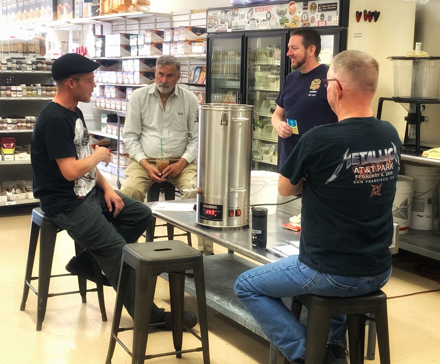 Brewing 101 students around the brew kettle